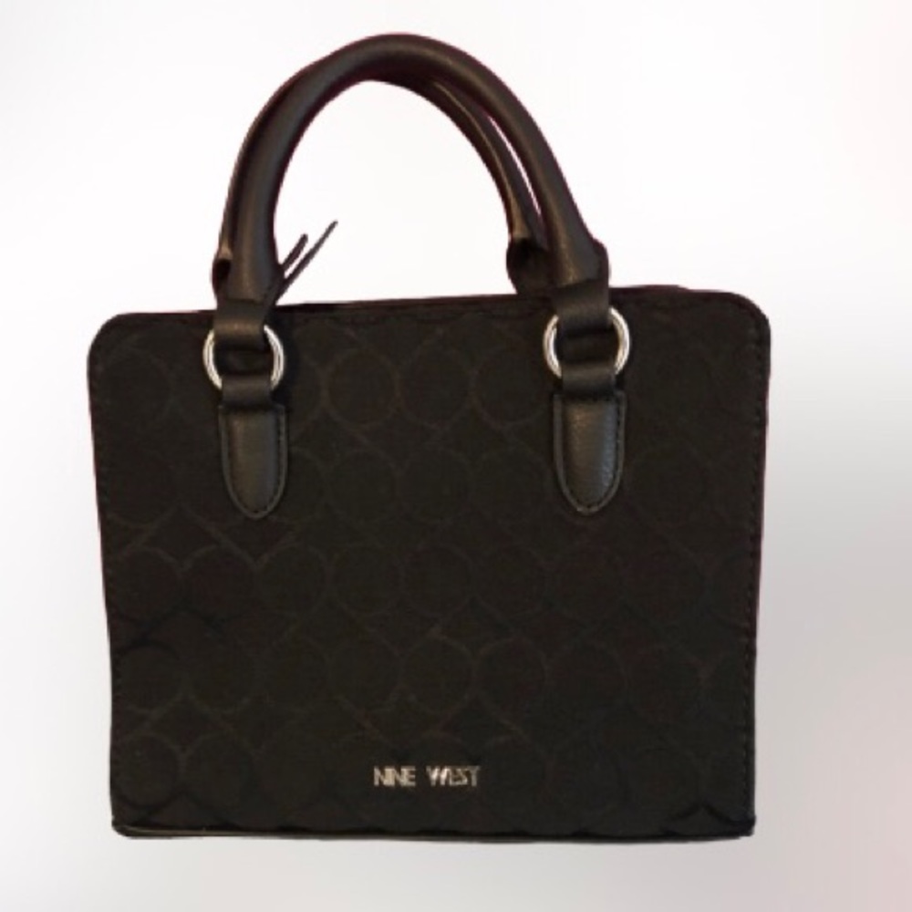 Nine West small purse, black fabric with leather handles and bottom.